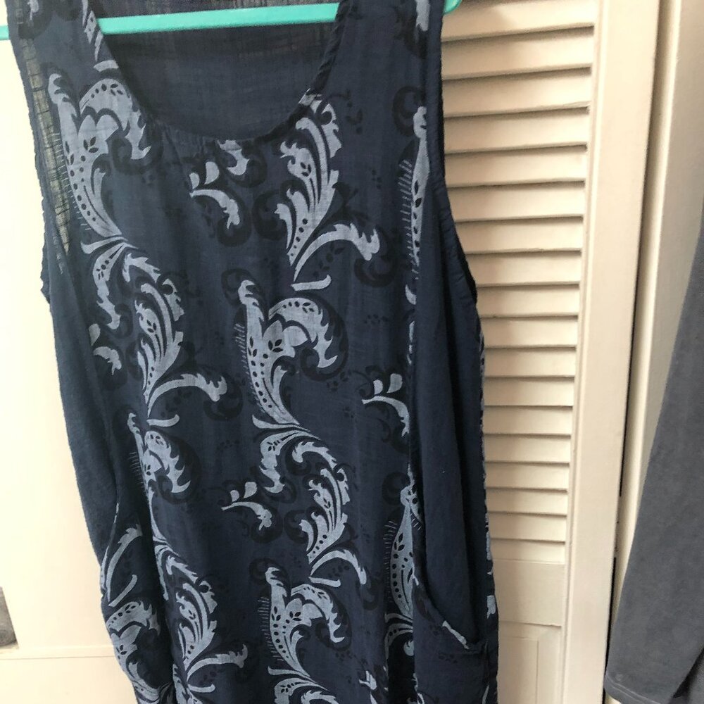 100% cotton dress. One size fits all. Made in Italy